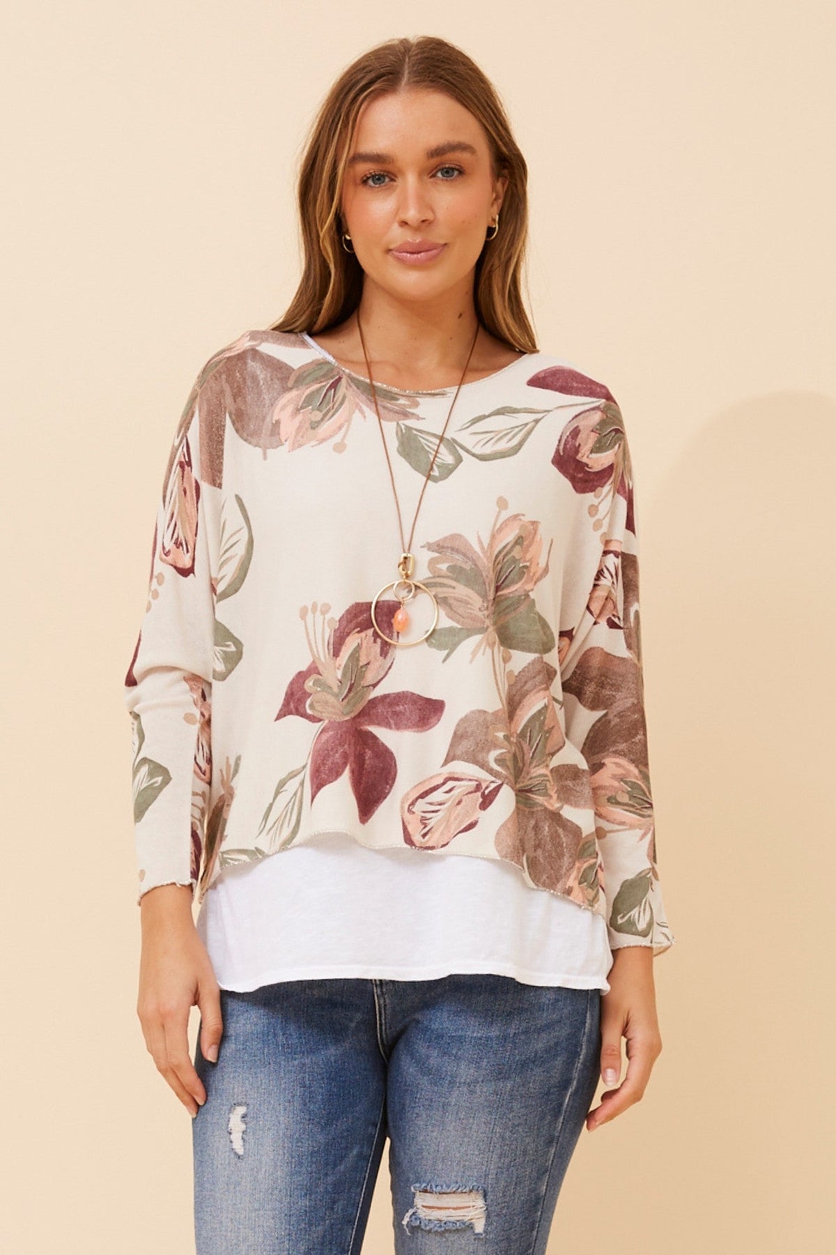 Image of a model wearing Tops. Product name - MELIKA DOUBLE LAYER TOP in Stone colour by brand - BOTTEGA MODA