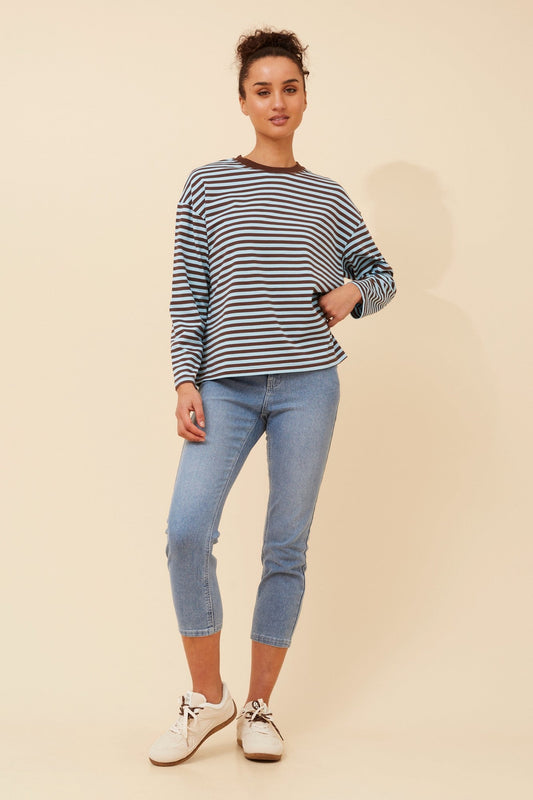Image of a model wearing Tops. Product name - MORGANA STRIPE PRINT TOP in Black/White colour by brand - Caroline Morgan Australia