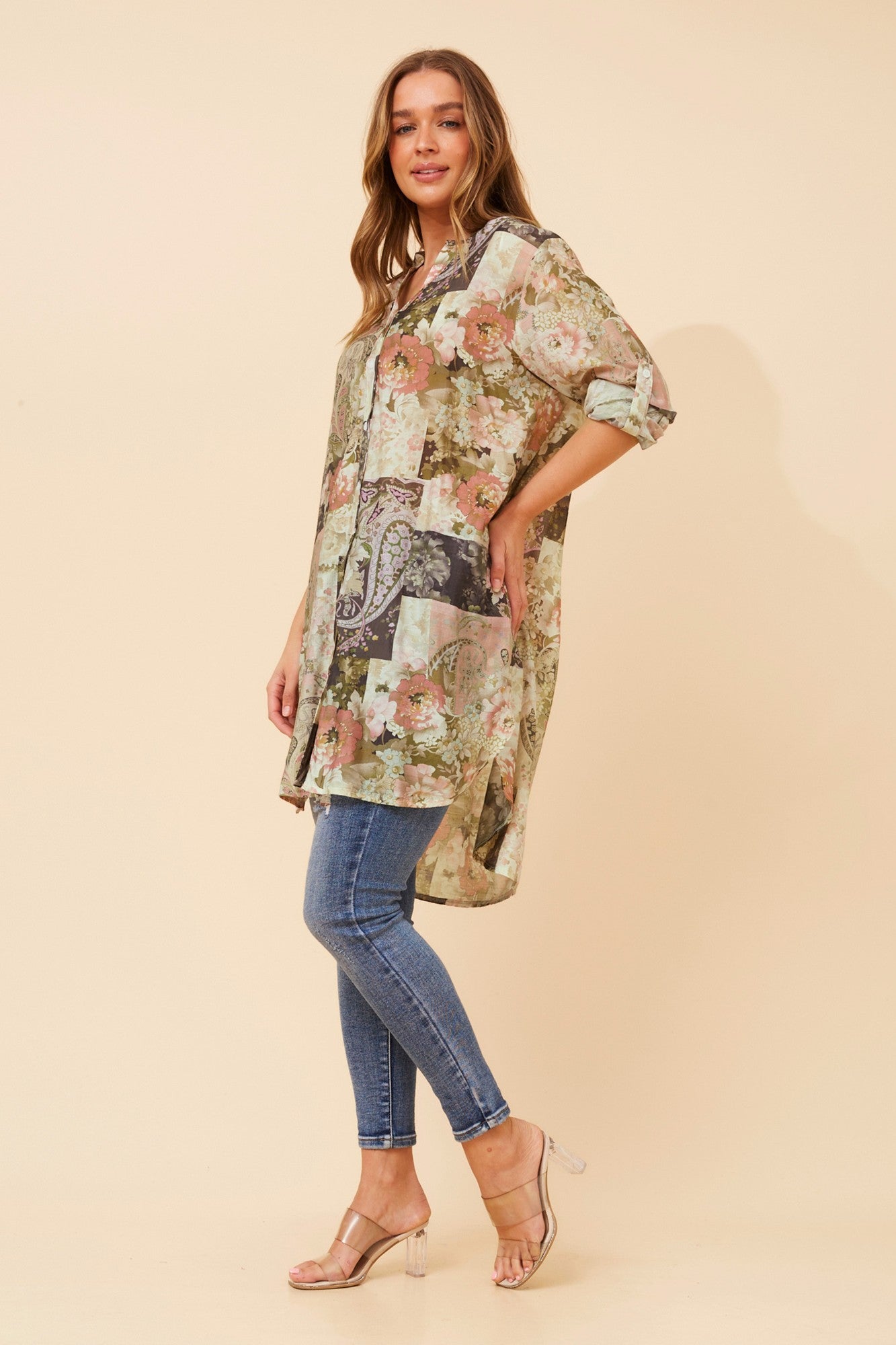 Image of a model wearing Outerwear. Product name - JANSON PATCHWORK PRINT TUNIC SHIRT in Olive colour by brand - Caroline Morgan Australia