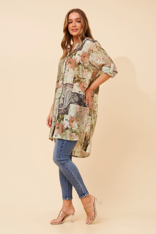 Image of a model wearing Outerwear. Product name - JANSON PATCHWORK PRINT TUNIC SHIRT in Olive colour by brand - Caroline Morgan Australia