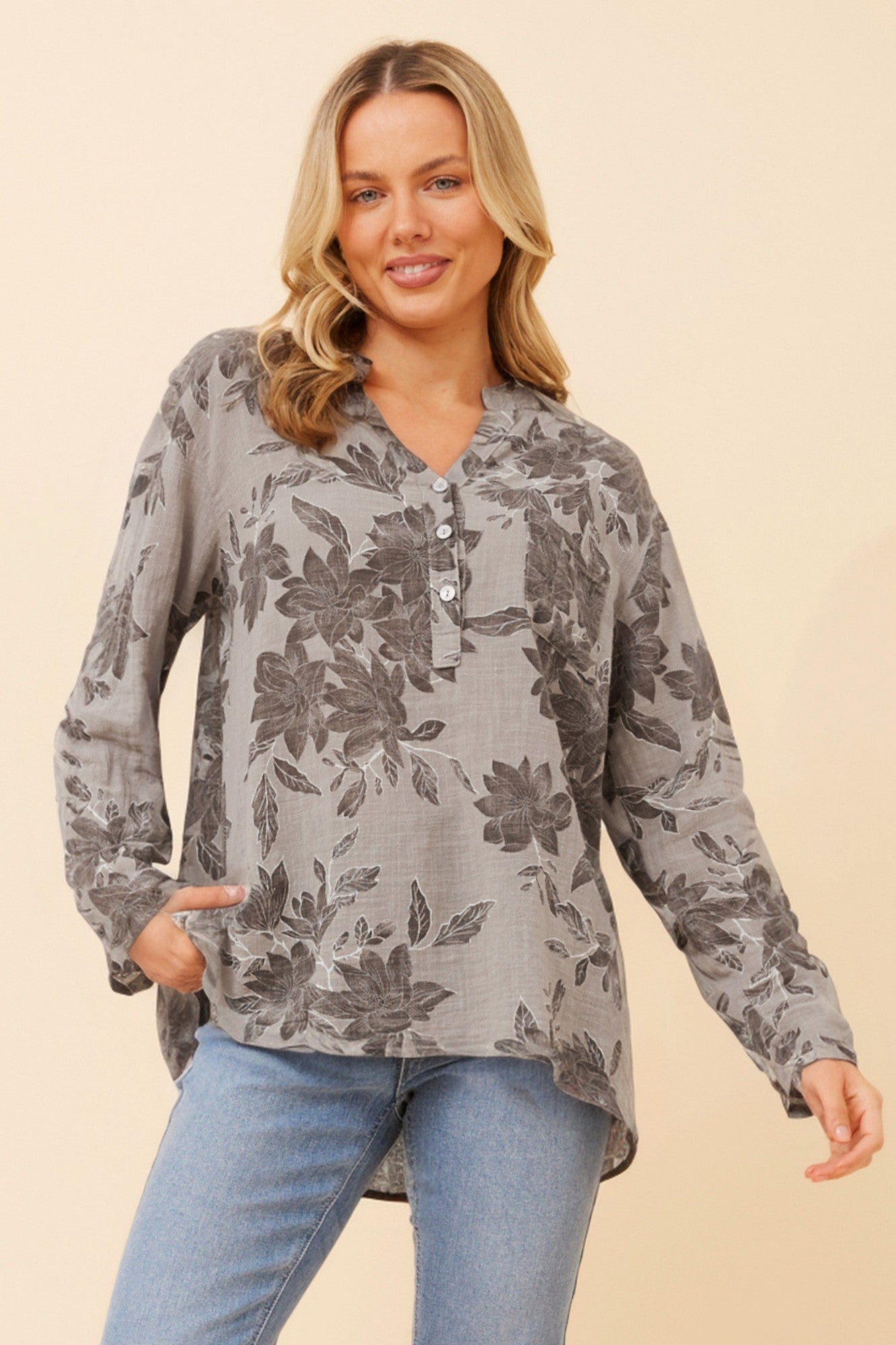Image of a model wearing Tops. Product name - ROSETTA LEAF PRINT TOP in Fango colour by brand - BOTTEGA MODA