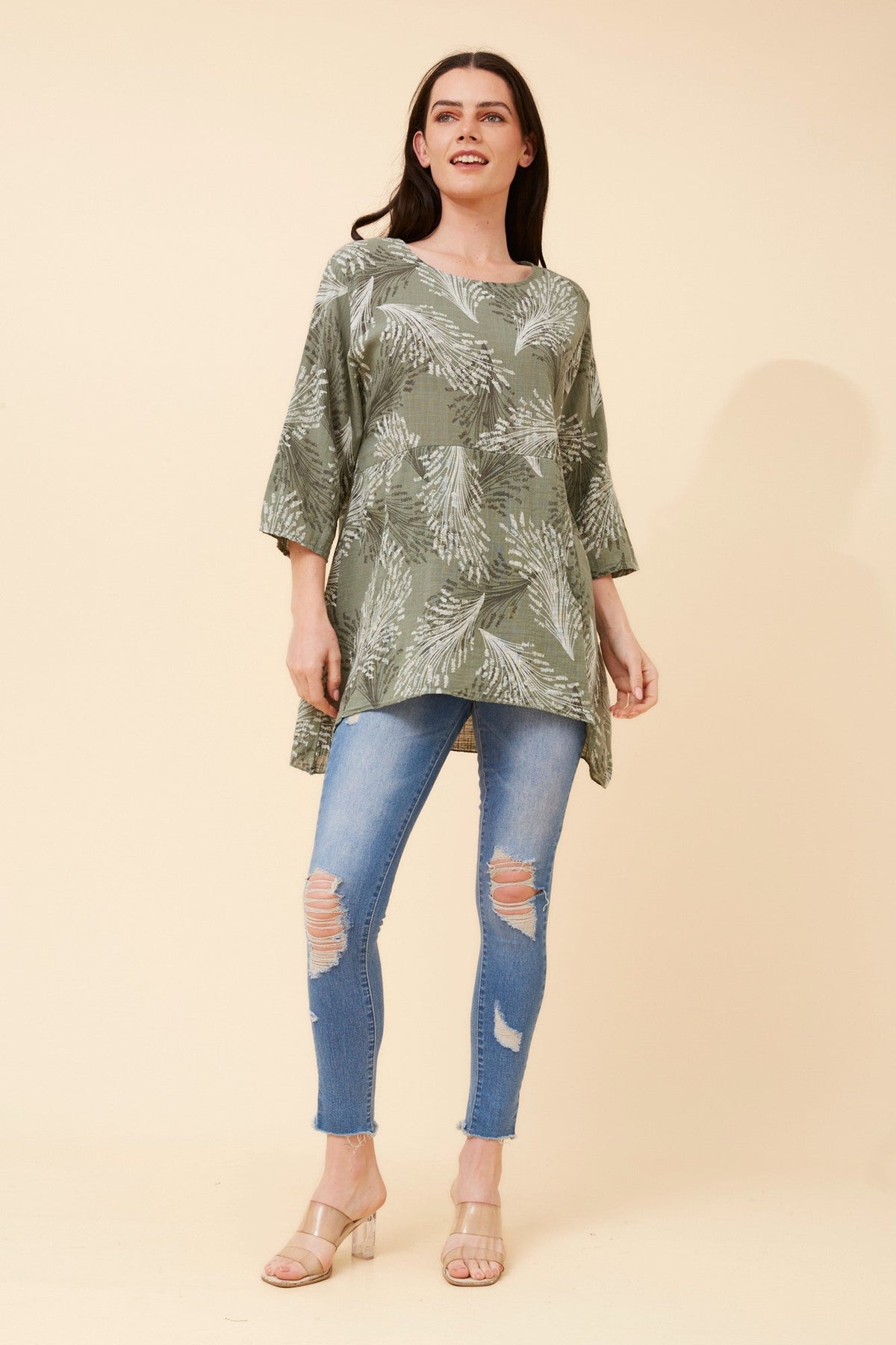 Image of a model wearing Tops. Product name - ELOISA ABSTRACT PRINT TOP in Ivory colour by brand - BOTTEGA MODA