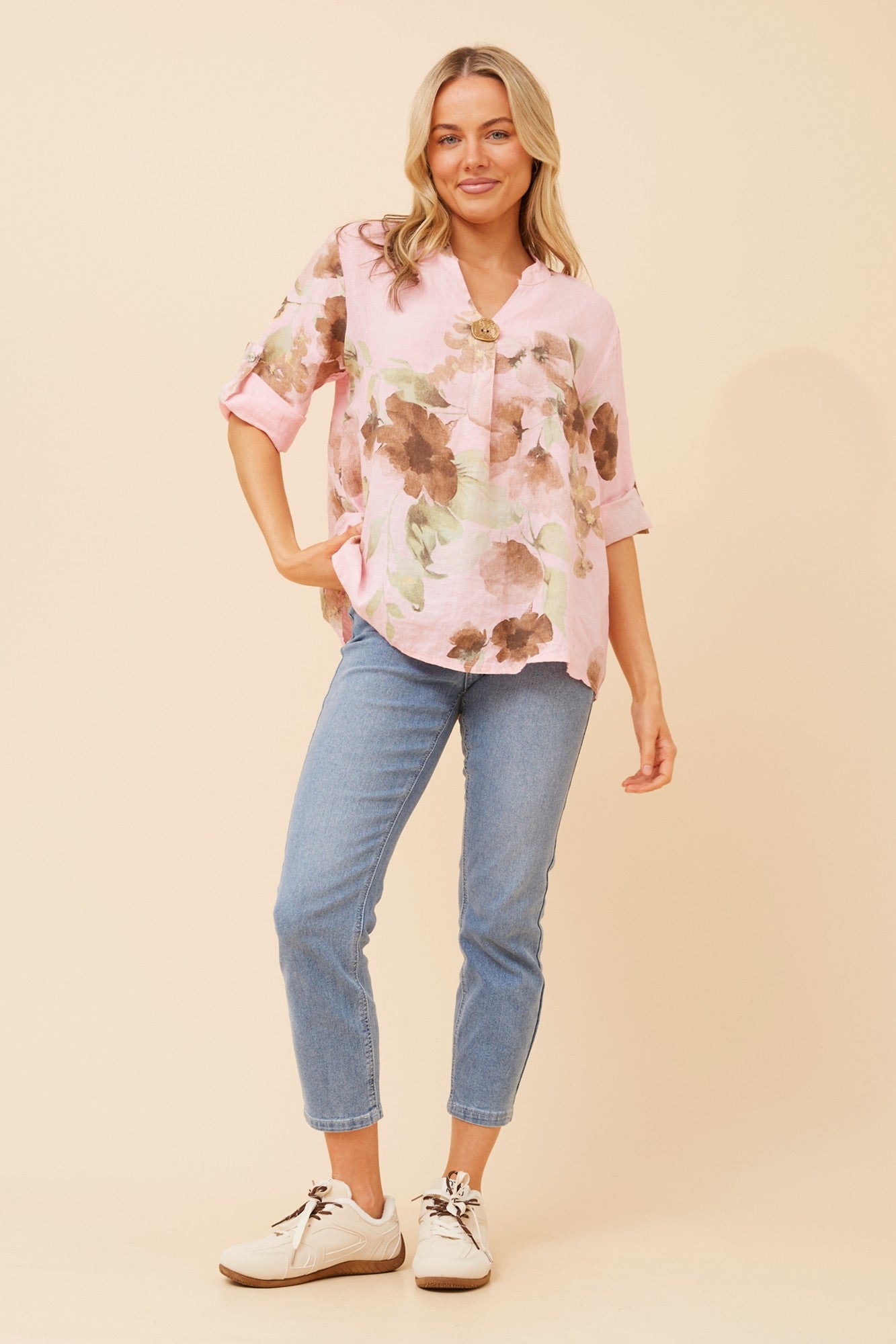 Image of a model wearing Tops. Product name - GREGORIA FLORAL LINEN TOP in Khaki colour by brand - BOTTEGA MODA