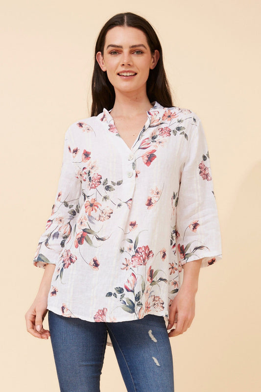 Image of a model wearing Tops. Product name - IVALDA FLORAL LINEN TOP in Multi White colour by brand - BOTTEGA MODA