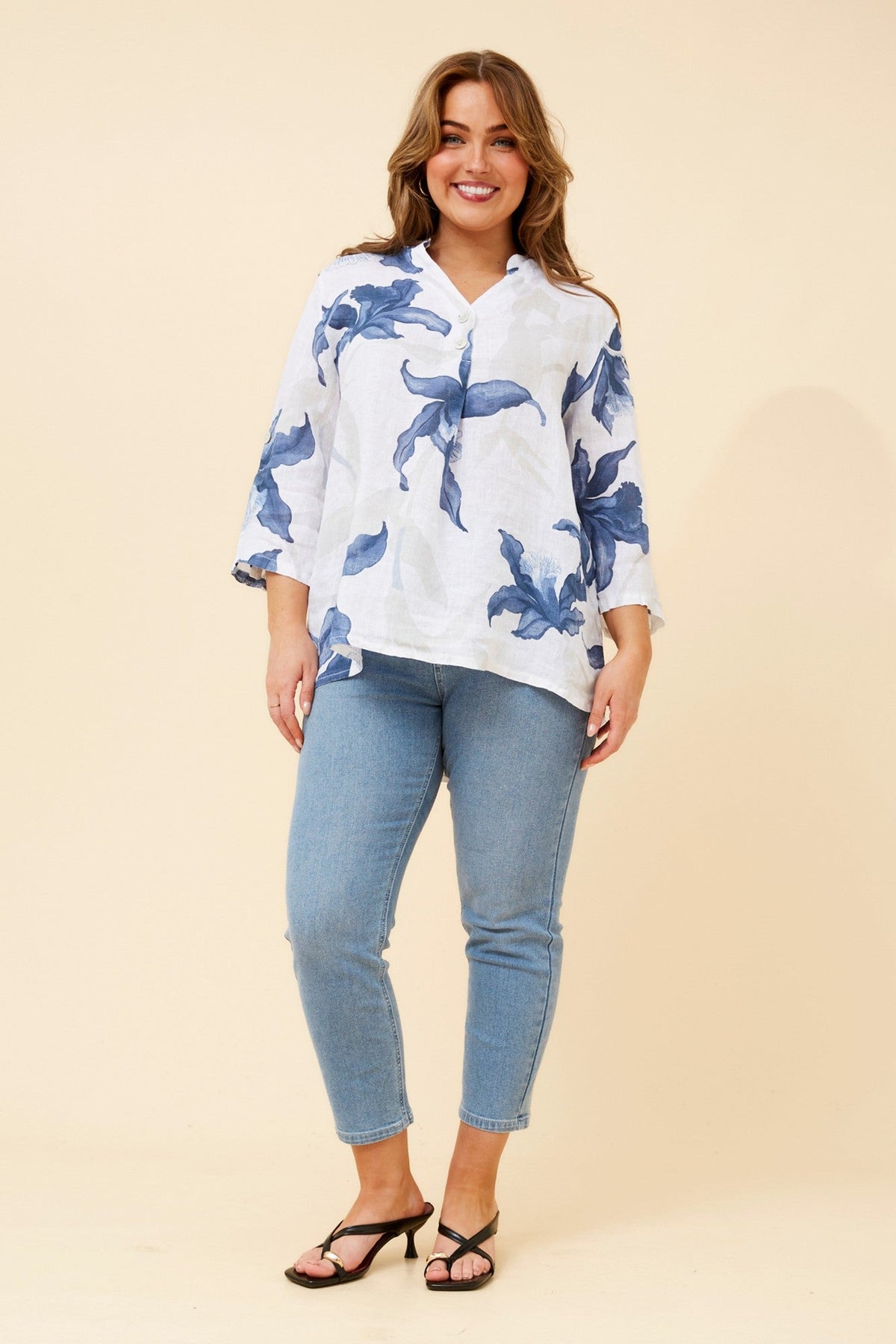 Image of a model wearing Tops. Product name - IVALDA LEAF PRINT LINEN TOP in Gumleaf colour by brand - BOTTEGA MODA