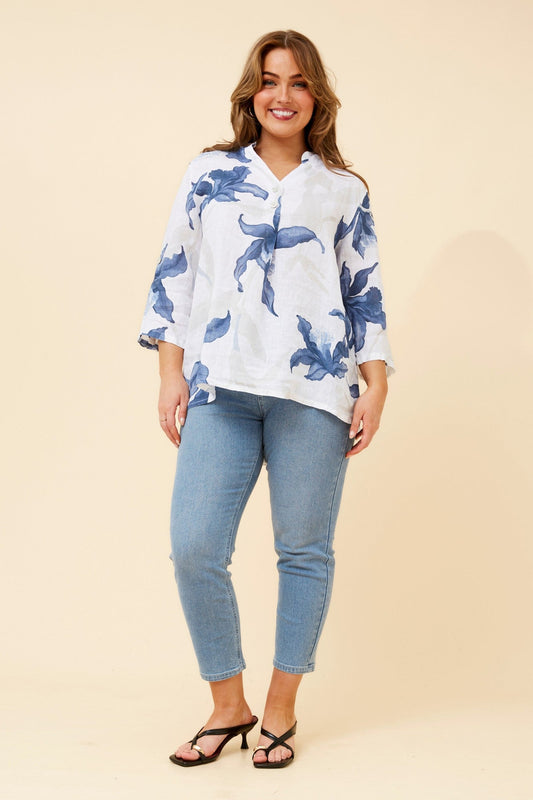 Image of a model wearing Tops. Product name - IVALDA LEAF PRINT LINEN TOP in Gumleaf colour by brand - BOTTEGA MODA