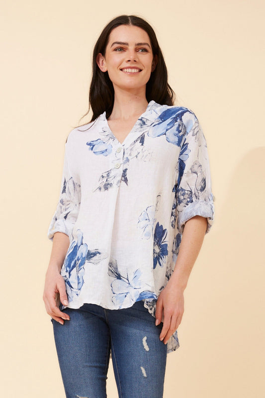 Image of a model wearing Tops. Product name - IVALDA FLORAL LINEN TOP in White colour by brand - BOTTEGA MODA