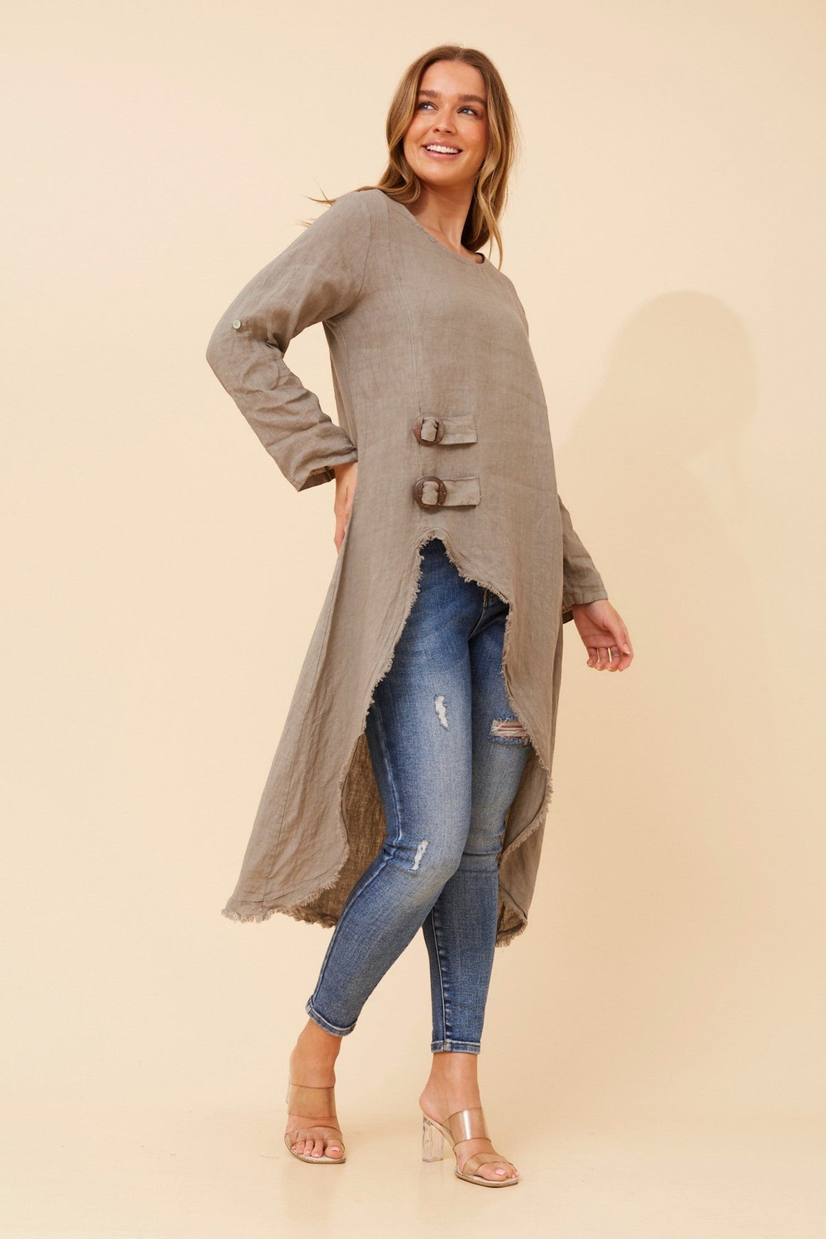 Image of a model wearing Tops. Product name - PAMINA SOLID LINEN TOP in Fango colour by brand - BOTTEGA MODA
