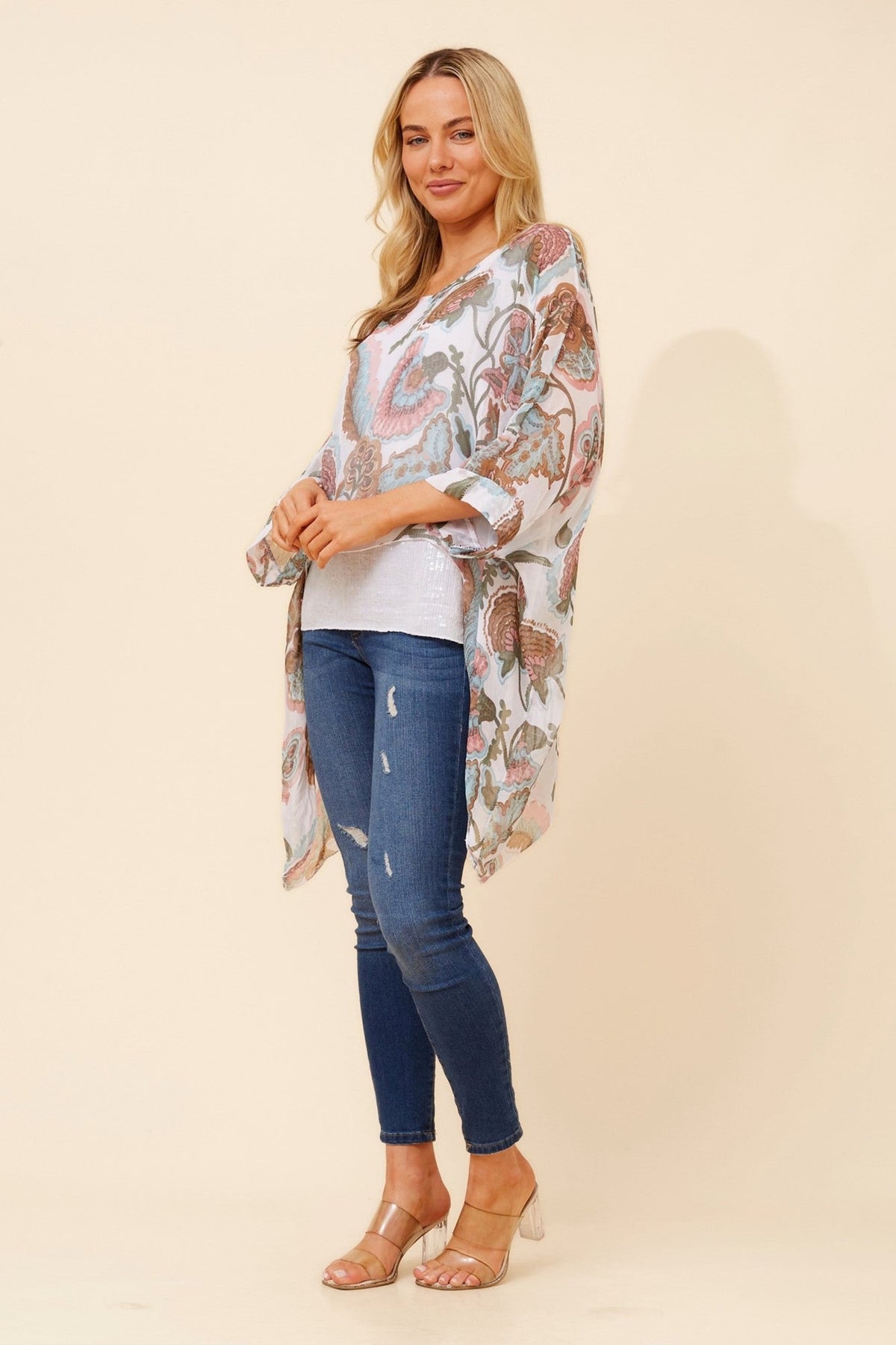 Image of a model wearing Tops. Product name - ENNA SILK BLEND DOUBLE LAYERED TOP in Multi White colour by brand - BOTTEGA MODA