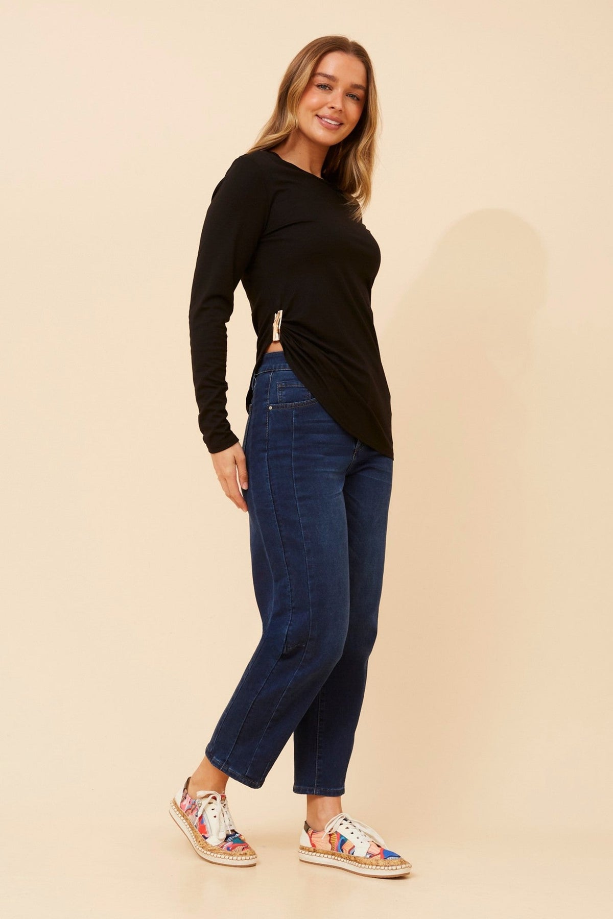 Image of a model wearing Tops. Product name - PAVIE SOLID TOP in Black colour by brand - Caroline Morgan Australia