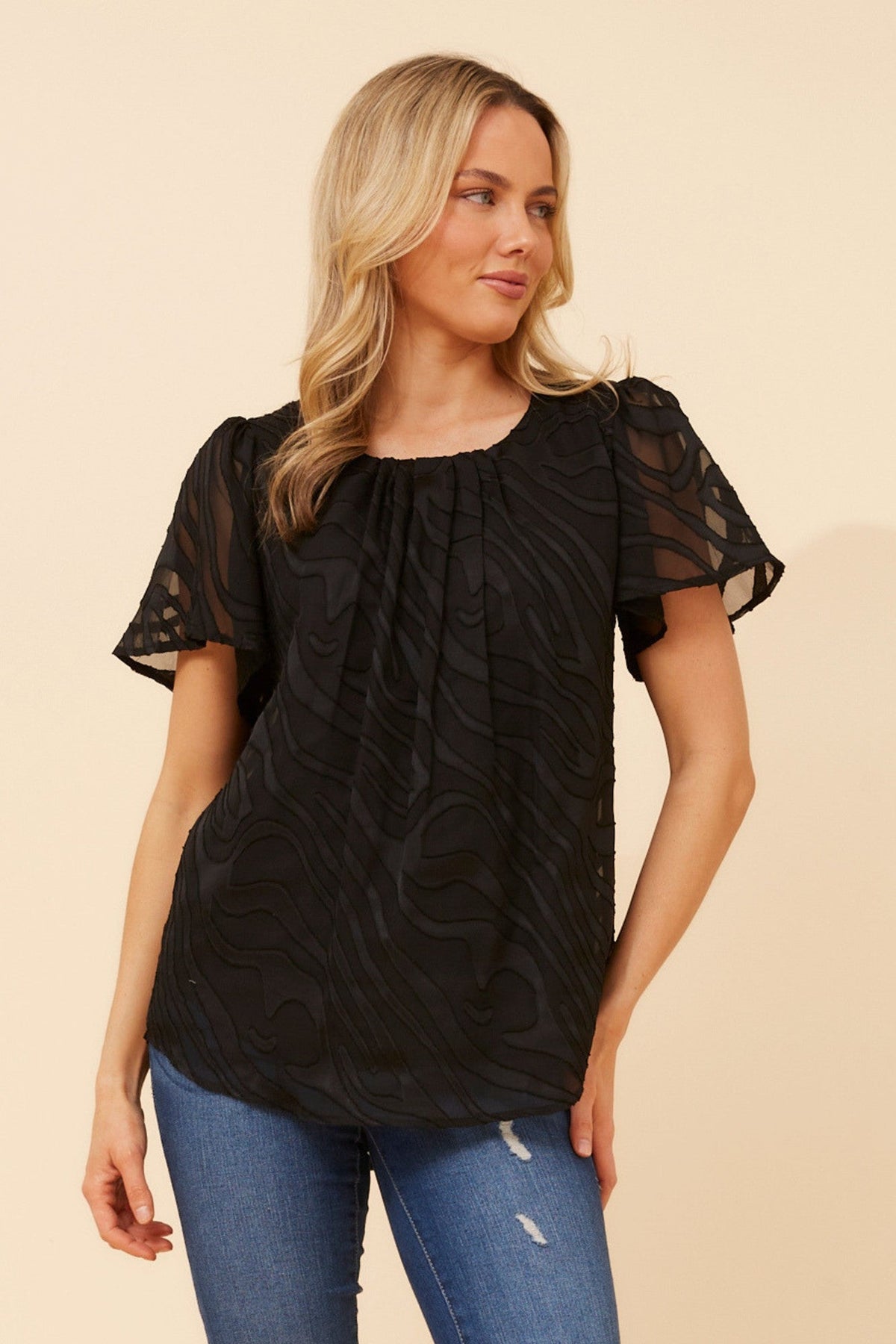 Image of Blouses. Product name - CHARLETTE BURNOUT BLOUSE in Black colour by brand - Caroline Morgan Australia