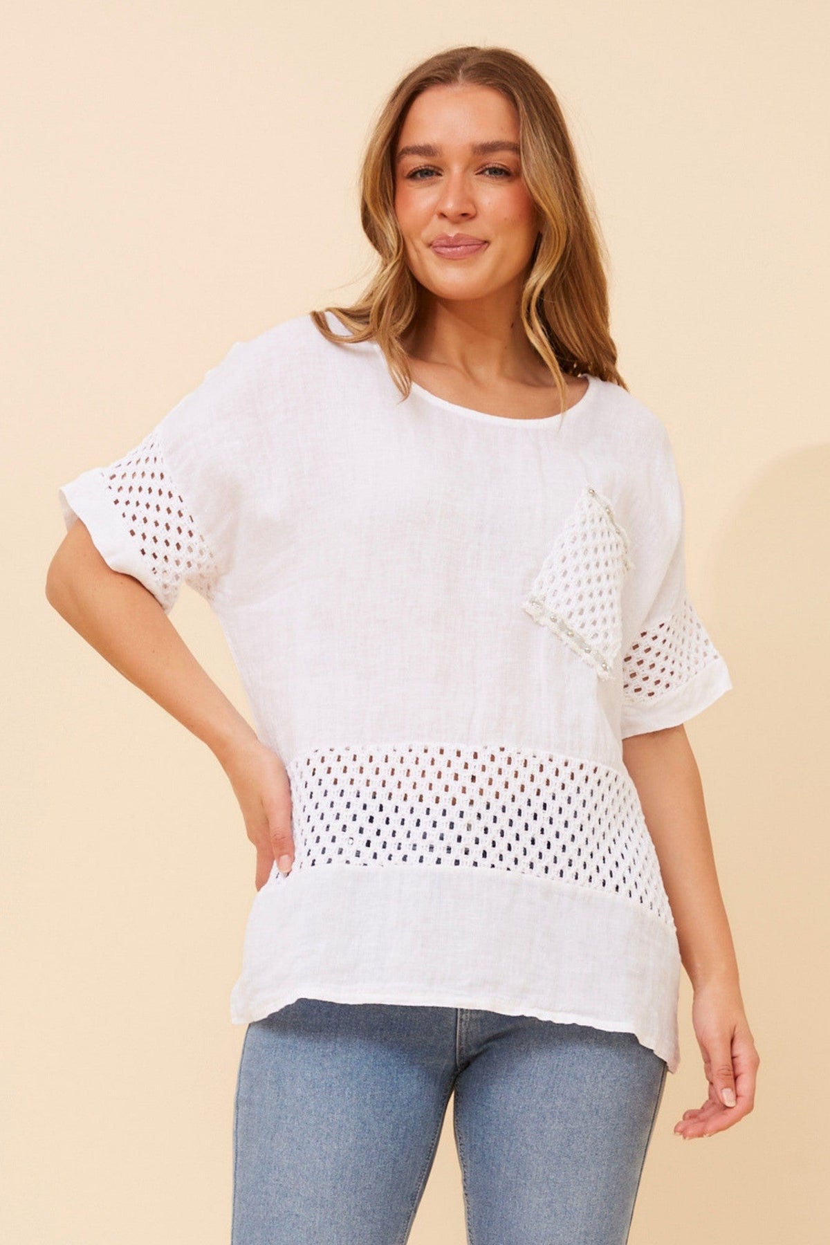 Image of a model wearing Tops. Product name - MORRA PATCHWORK LINEN TOP in Bitter Chocolate colour by brand - BOTTEGA MODA