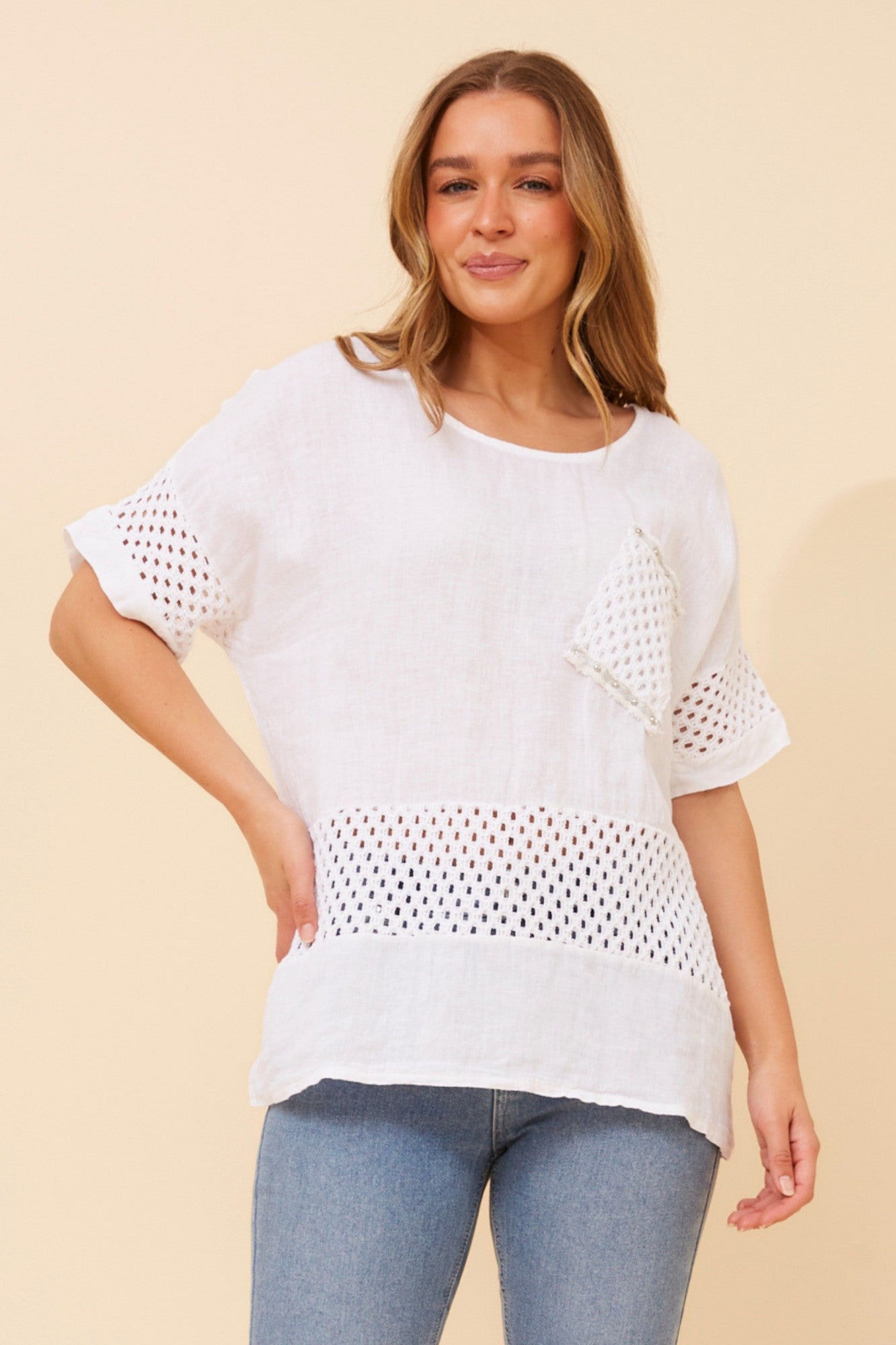Image of a model wearing Tops. Product name - MORRA PATCHWORK LINEN TOP in Bitter Chocolate colour by brand - BOTTEGA MODA