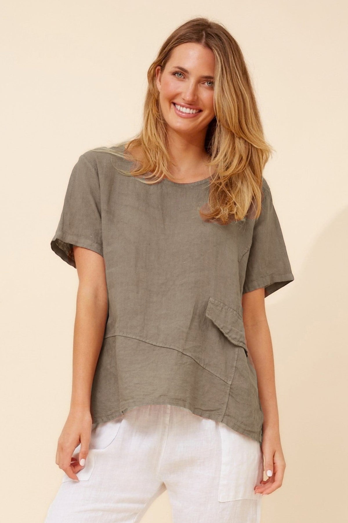 Image of a model wearing Tops. Product name - ONA SOLID LINEN TOP in Fango colour by brand - BOTTEGA MODA