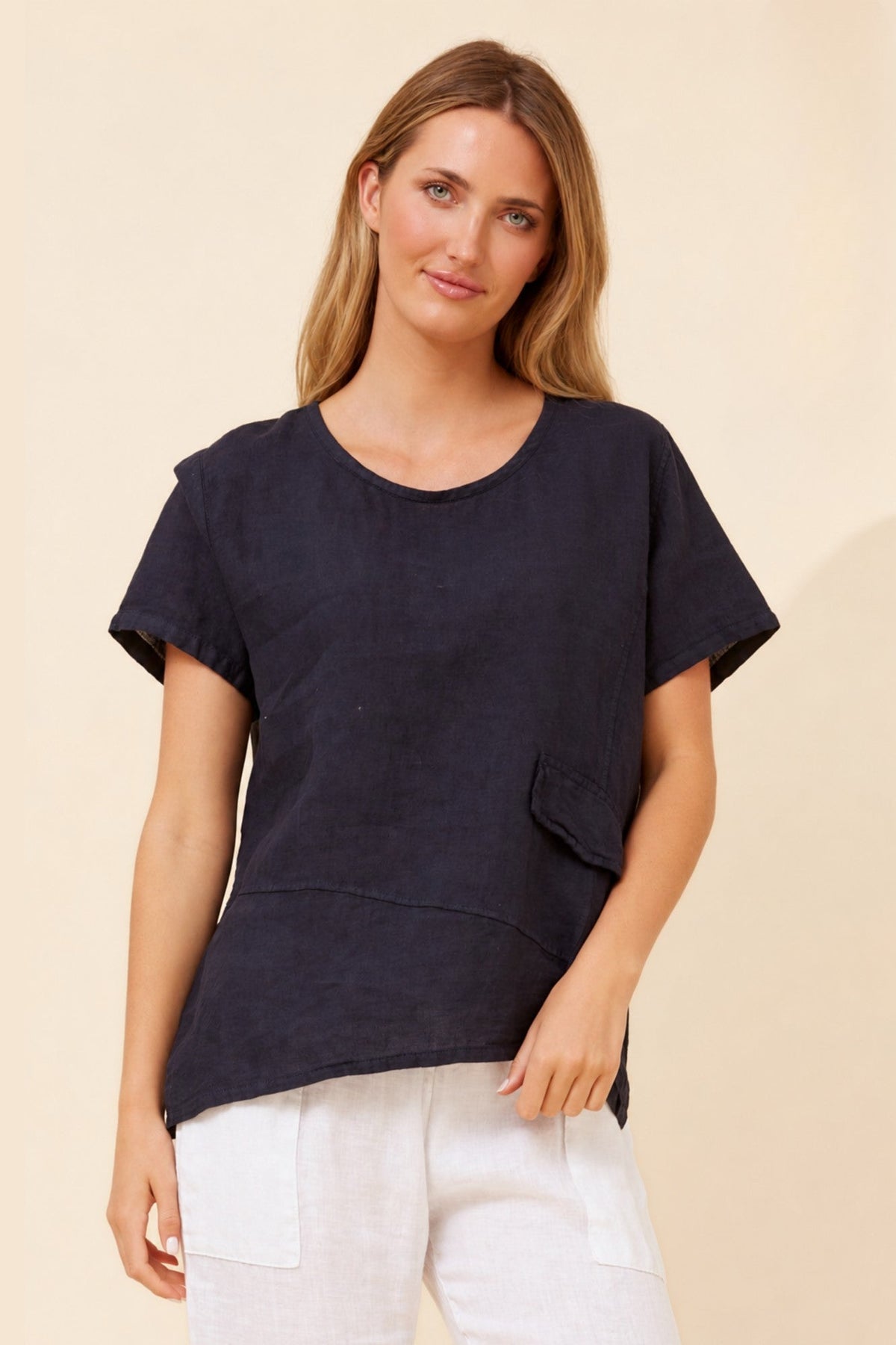 Image of a model wearing Tops. Product name - ONA SOLID LINEN TOP in Navy colour by brand - BOTTEGA MODA