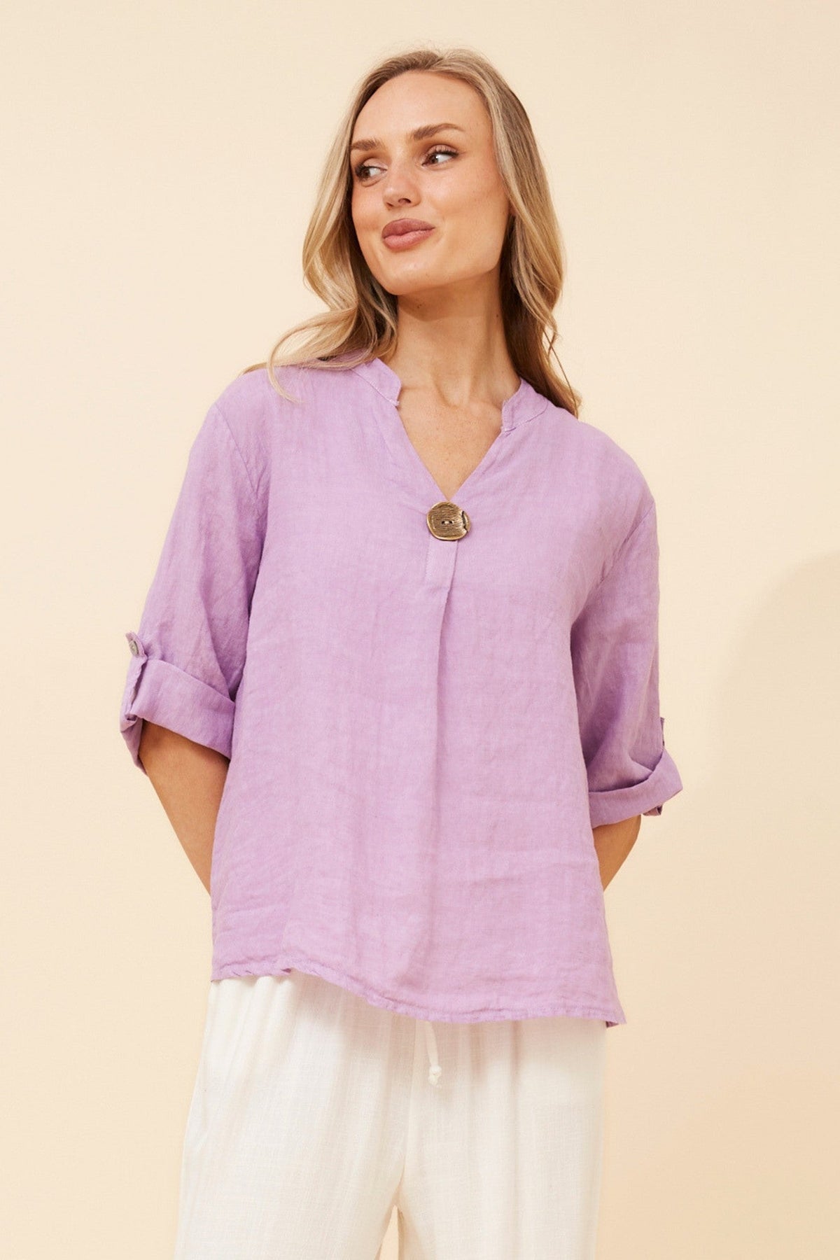 Image of a model wearing Tops. Product name - GREGORIA SOLID LINEN TOP in Lilac colour by brand - BOTTEGA MODA