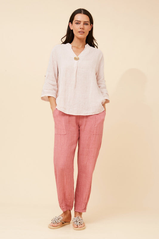 Image of a model wearing Tops. Product name - GREGORIA SOLID LINEN TOP in Pink colour by brand - BOTTEGA MODA