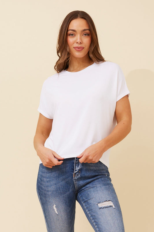 Image of a model wearing Tops. Product name - JILLIE SHORT SLEEVE TSHIRT in Rich Red colour by brand - Caroline Morgan Australia