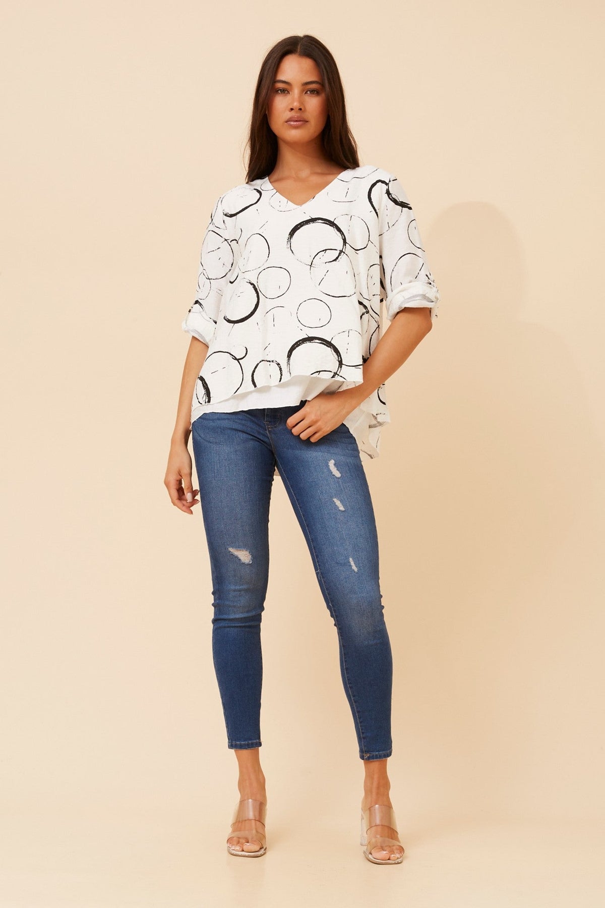 Image of a model wearing Tops. Product name - LORETO DOUBLE LAYER TOP in Black colour by brand - Caroline Morgan Australia