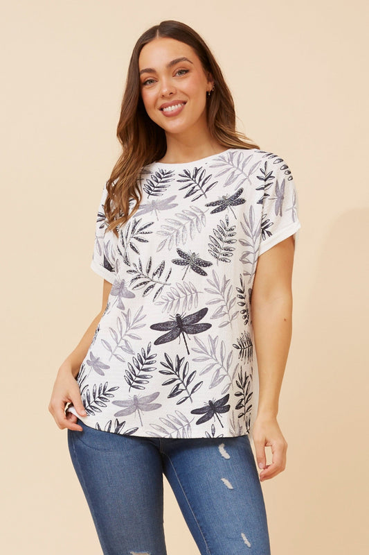 Image of a model wearing Tops. Product name - ANIANA LEAF PRINT TOP in White colour by brand - Caroline Morgan Australia