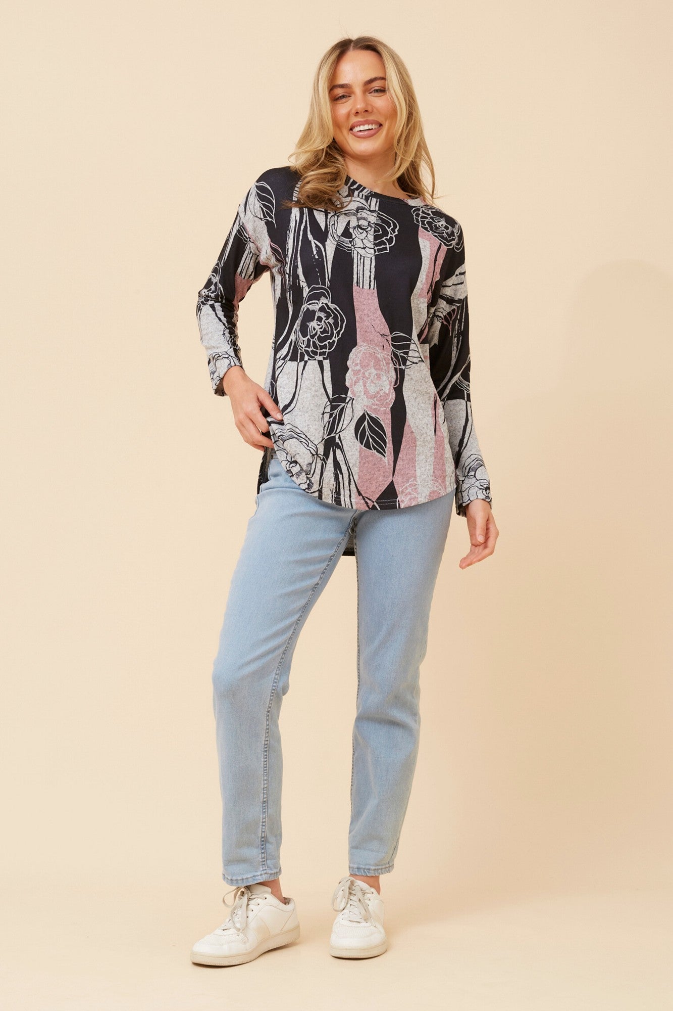 Image of a model wearing Tops. Product name - EVA ABSTRACT PRINT TOP in Multi Pink colour by brand - Caroline Morgan Australia
