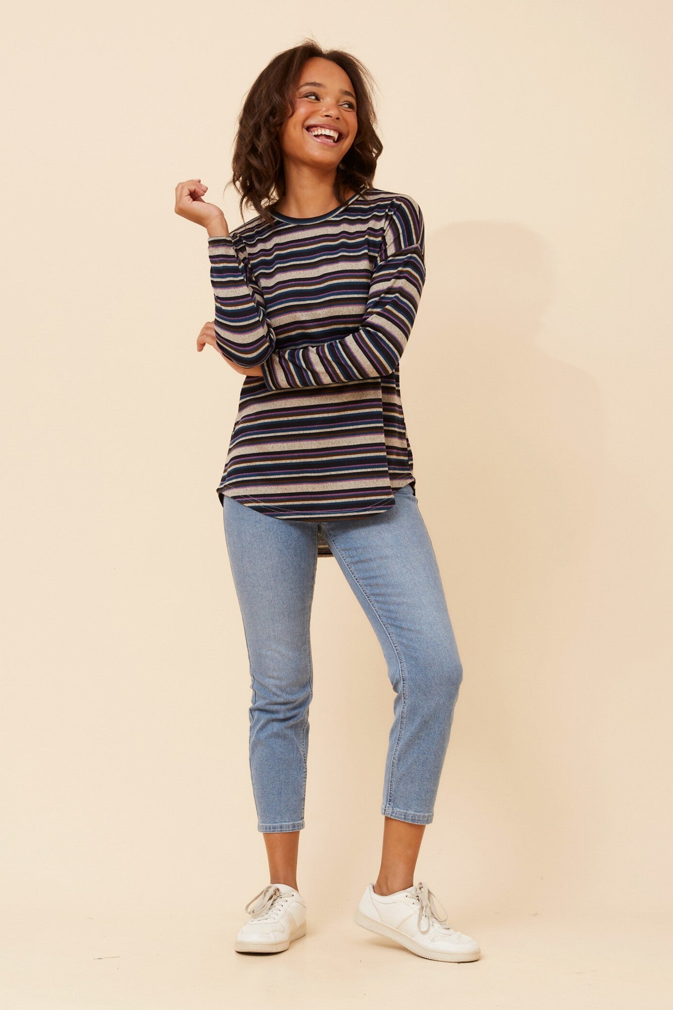 Image of a model wearing Tops. Product name - EVA STRIPE PRINT TOP in Multi Blue colour by brand - Caroline Morgan Australia