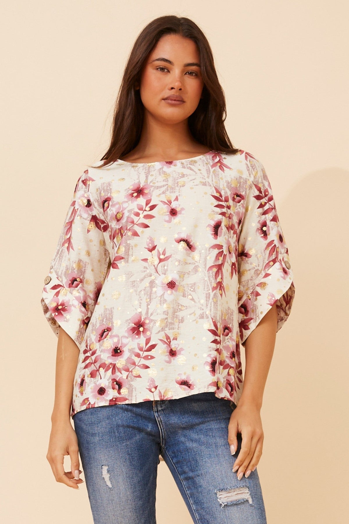 Image of a model wearing Tops. Product name - SAMANTHA FLORAL TOP in Multi Pink colour by brand - Caroline Morgan Australia