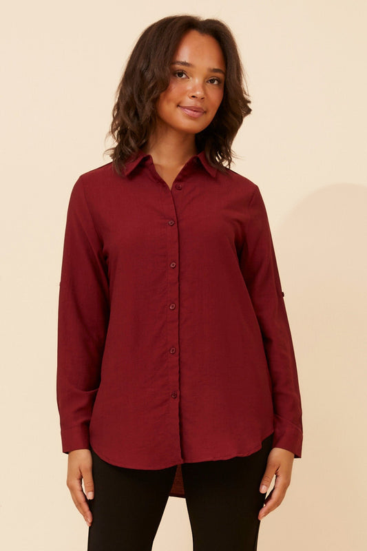 Image of Shirts. Product name - KLAUS CURVED HEM SHIRT in Blue colour by brand - Caroline Morgan Australia