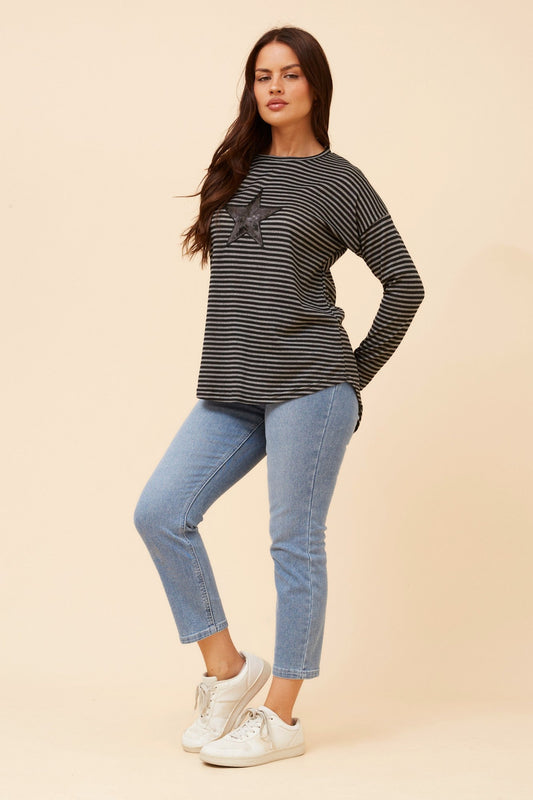 Image of a model wearing Tops. Product name - EVA SEQUIN STAR TOP in Blue colour by brand - Caroline Morgan Australia