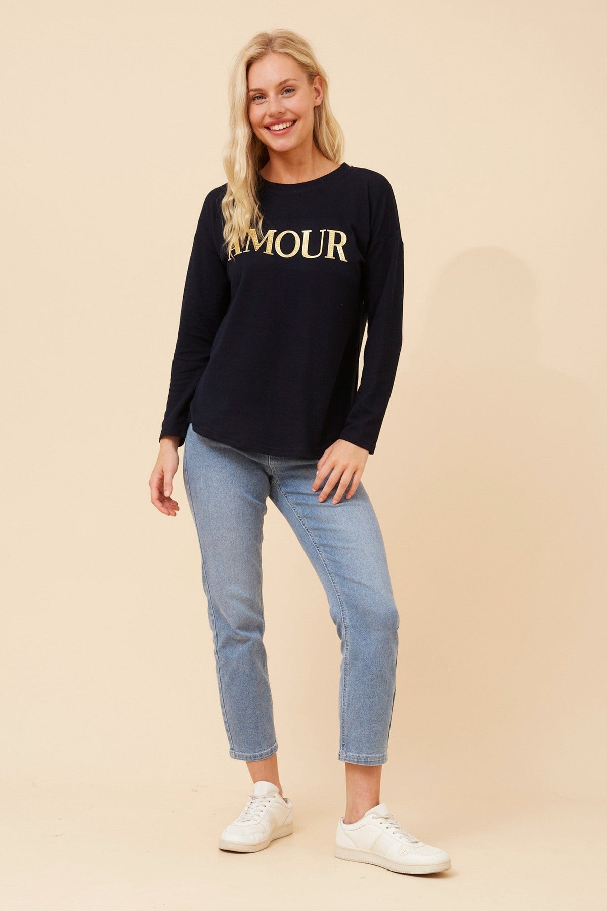Image of a model wearing Tops. Product name - EVA AMOUR TOP in Green Ash colour by brand - Caroline Morgan Australia