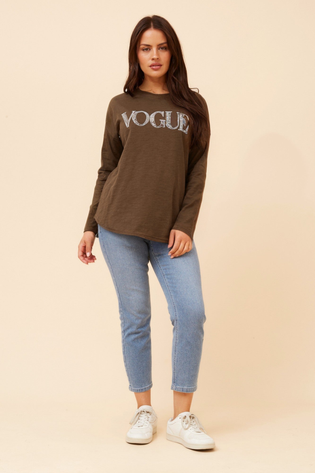 Image of a model wearing Tops. Product name - EVA VOGUE TOP in Chocolate colour by brand - Caroline Morgan Australia