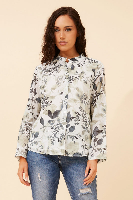 Image of a model wearing Tops. Product name - KRISTEL LEAF PRINT TOP in Multi Grey colour by brand - Caroline Morgan Australia