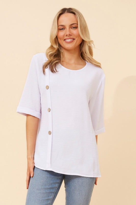 Image of a model wearing Tops. Product name - TAI SOLID TOP in White colour by brand - Caroline Morgan Australia