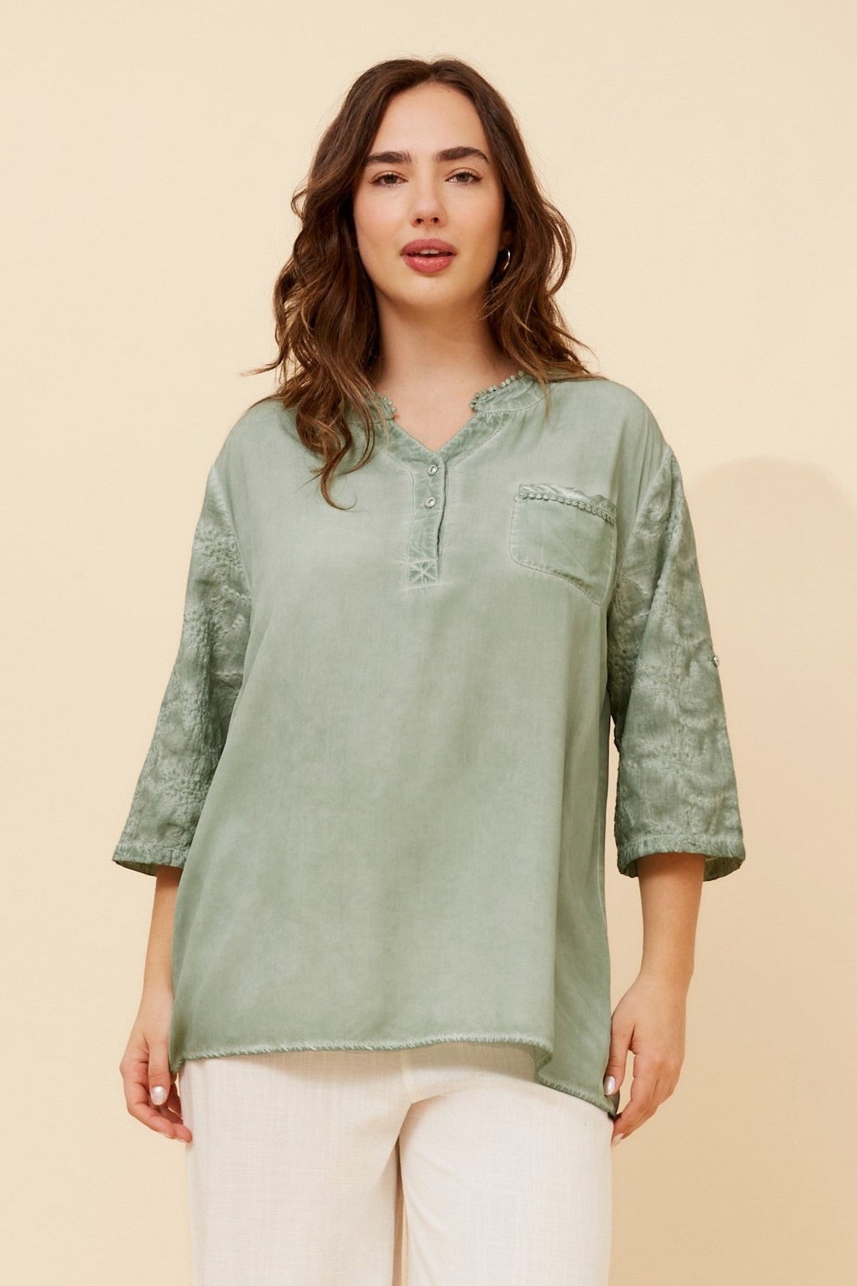 Image of a model wearing Tops. Product name - KAYLA EMBROIDERED TOP in Beige colour by brand - BOTTEGA MODA