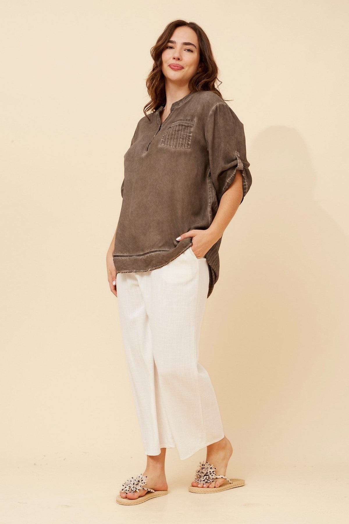 Image of a model wearing Tops. Product name - RAY SOLID TOP in Beige colour by brand - BOTTEGA MODA