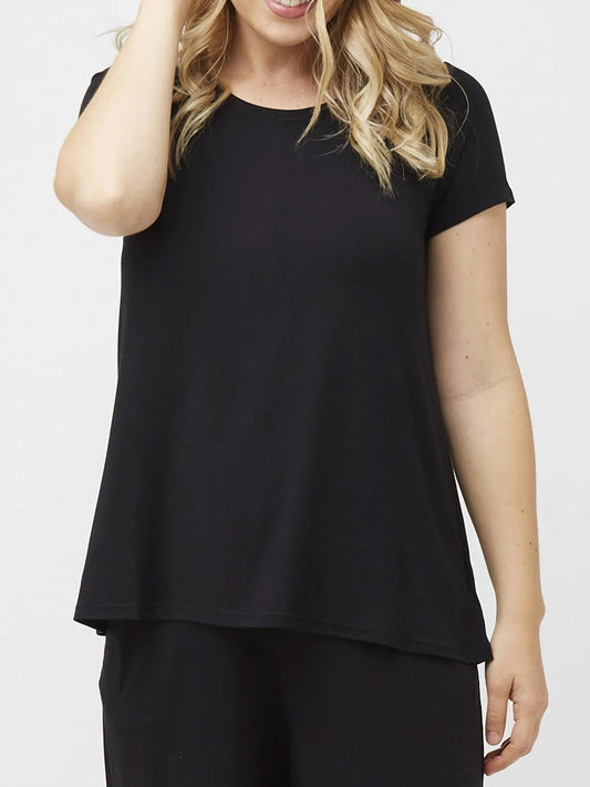 Image of a model wearing Tops. Productname: TANI SWING TEE in Black colour by brand - Tani