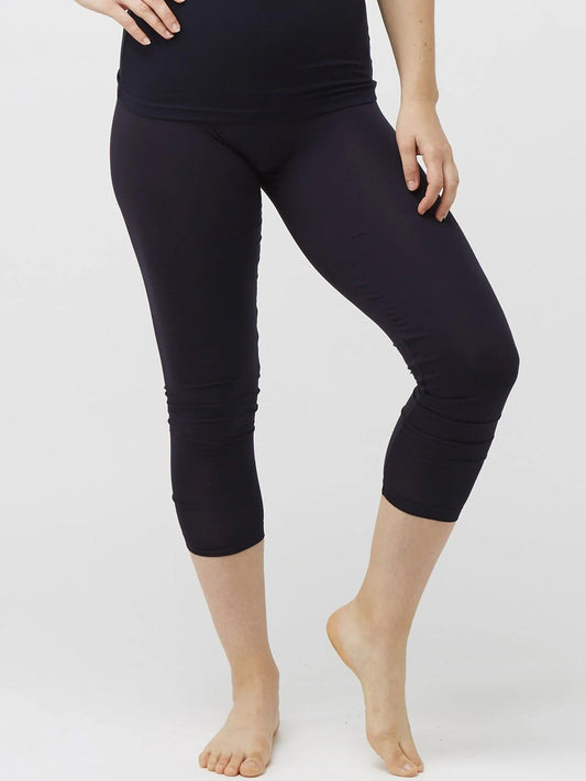 Image of a model wearing Pants. Productname: Tani Calf Leggings in Black colour by brand - Tani