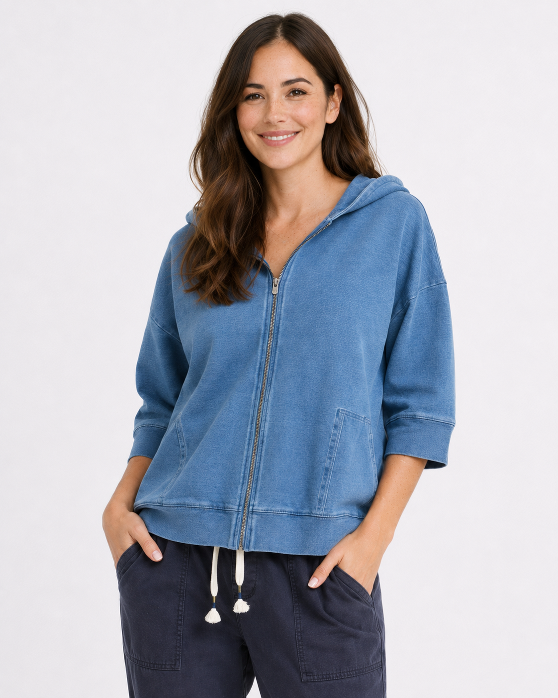 Image of a model wearing Outerwear. Product name - Tessa Denim Look Hoodie Blue in Blue colour by brand - Elm