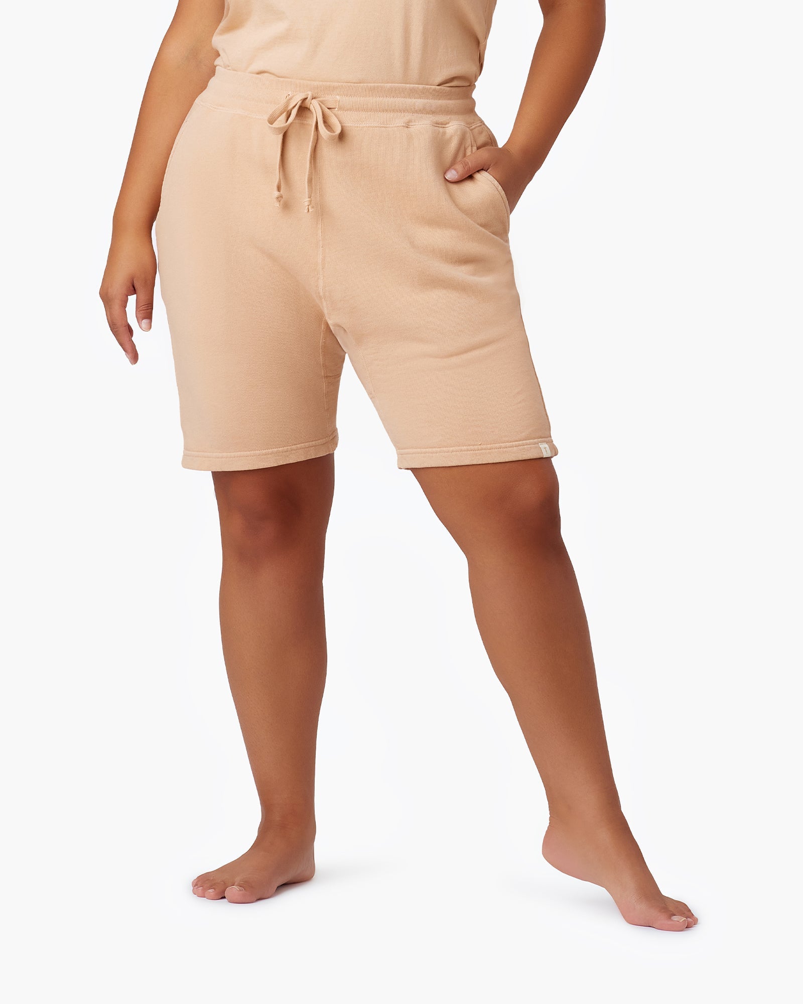 Image of a model wearing Shorts. Productname: Core Short Bisque in Bisque colour by brand - TKEES