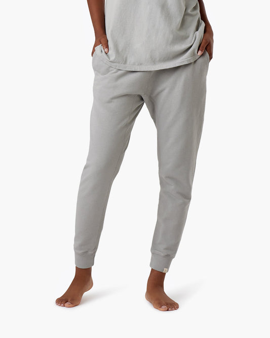 Image of a model wearing Pants. Productname: Core Sport Jogger Dove in Dove colour by brand - TKEES