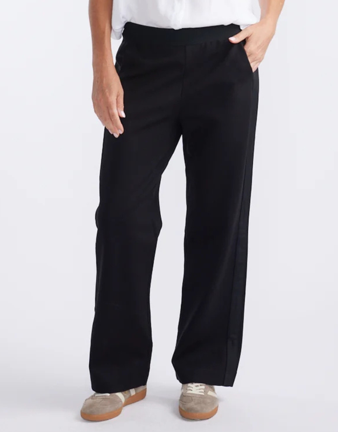 Image of a model wearing Pants. Product name - Timeless Straight Leg Ponte Pant Black On Black in Black On Black colour by brand - White & Co.
