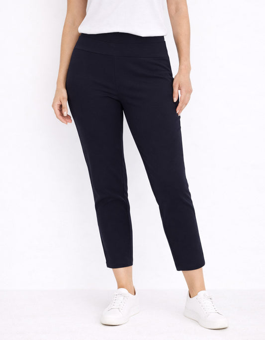 Image of a model wearing Pants. Productname: The 24/7 Bengaline Crop Pant - in Navy colour by brand - Tirelli