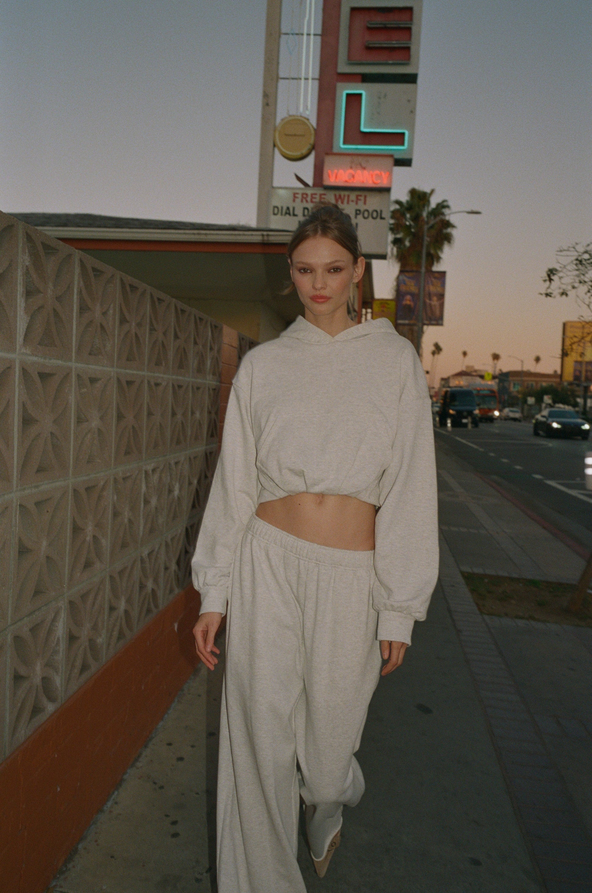 Image of a model wearing Outerwear. Product name - Tommy Sweater in Grey colour by brand - With Jéan
