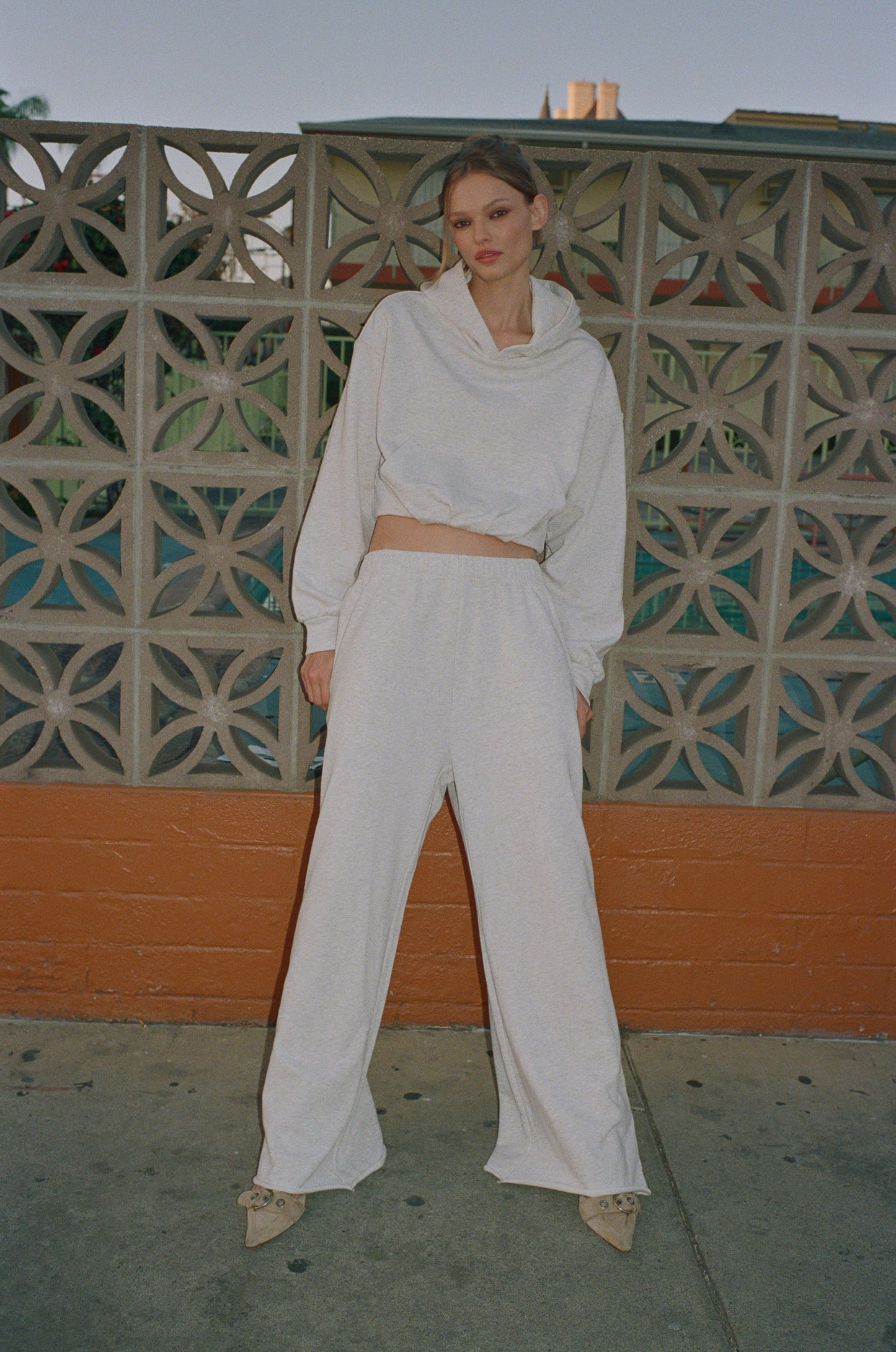 Image of a model wearing Pants. Product name - Tommy Track Pant in Grey colour by brand - With Jéan