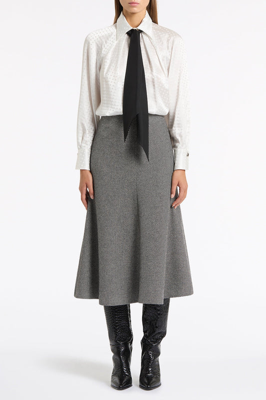 Image of a model wearing Skirts. Product name - Twill Coating Flare Skirt in Grey colour by brand - Carla Zampatti