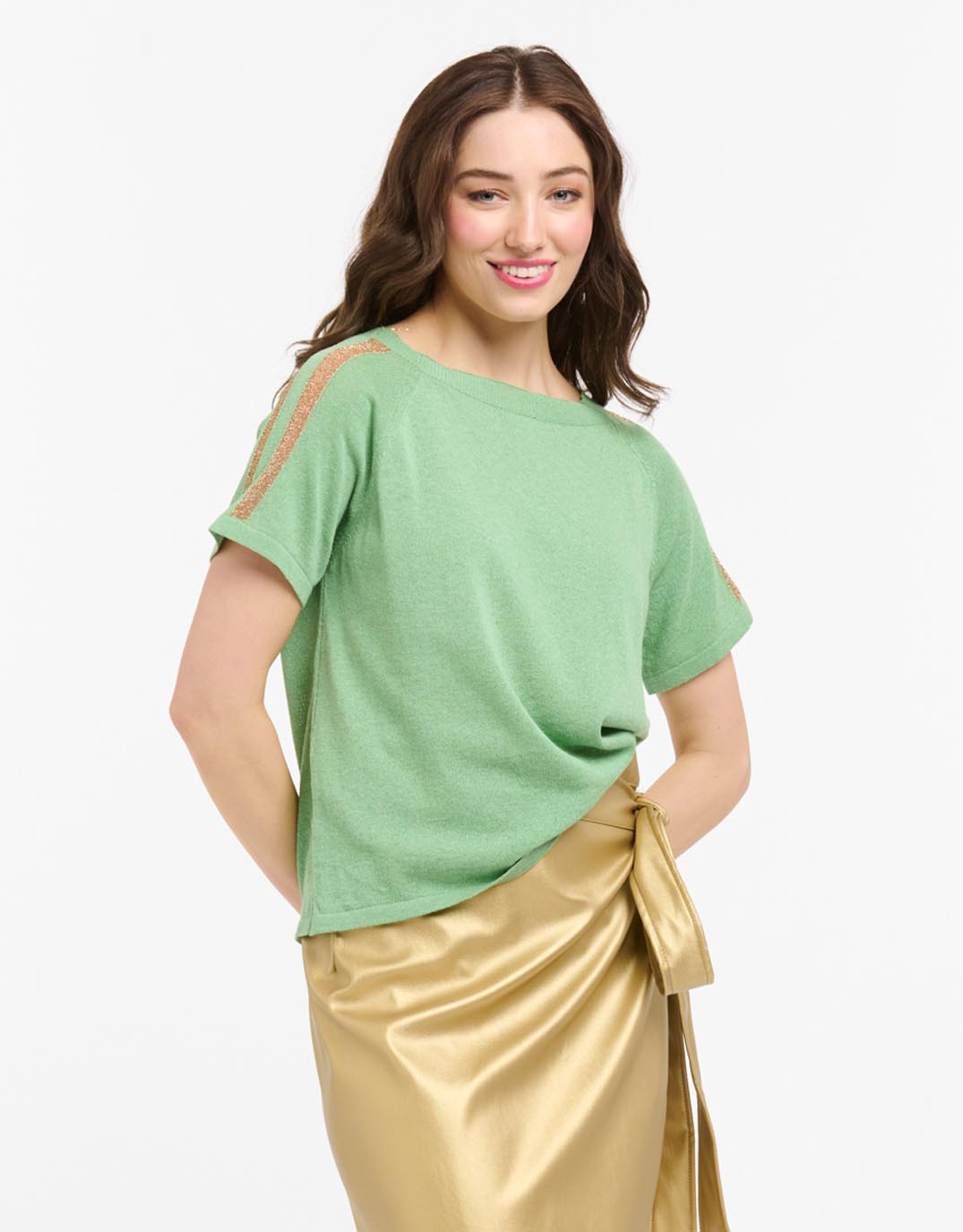 Image of a model wearing Outerwear. Productname: Lurex Shoulder Sweater - in Green/Rose Gold colour by brand - Urban Luxury