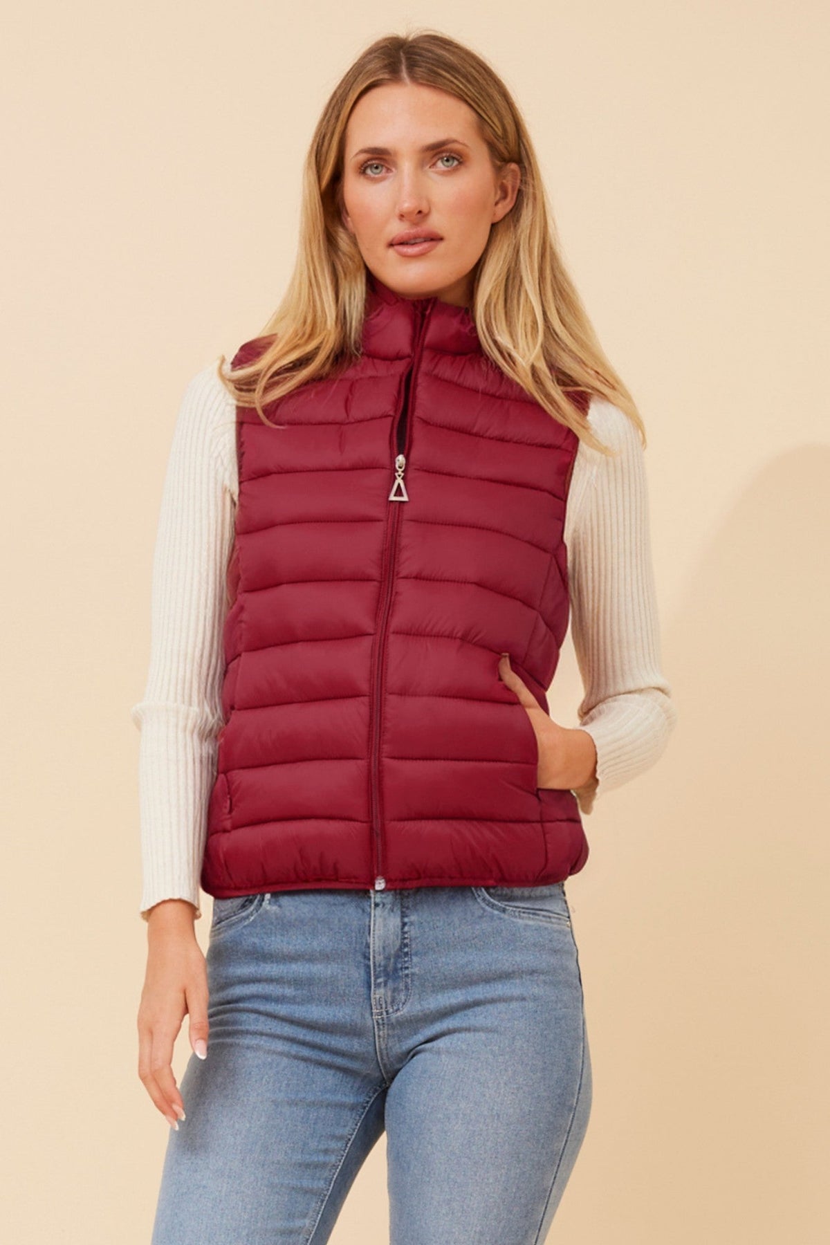 Image of Coats & Jackets. Product name - ZARLA PUFFER VEST in Black colour by brand - Caroline Morgan Australia