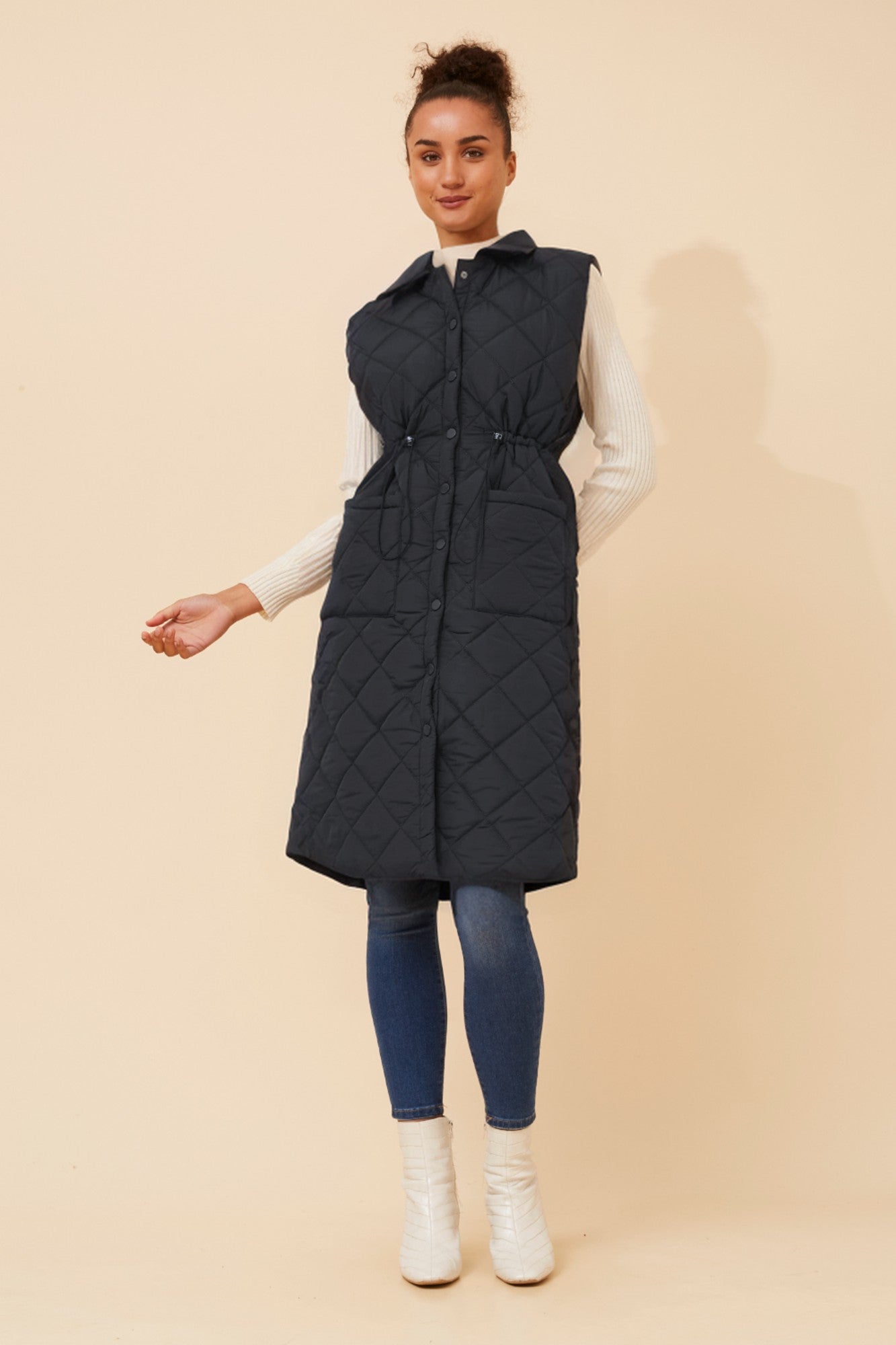 Image of Coats & Jackets. Product name - DEDE QUILTED VEST in Black colour by brand - Caroline Morgan Australia