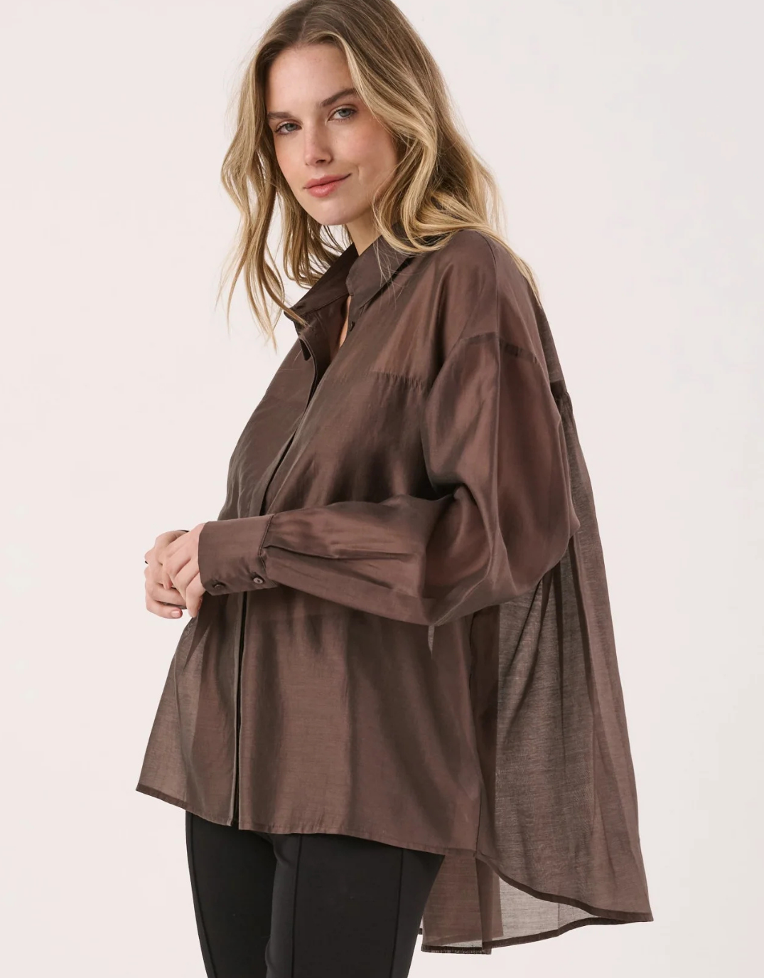 Image of a model wearing Tops. Product name - Val Oversized Shirt Chocolate in Chocolate colour by brand - Sass Clothing