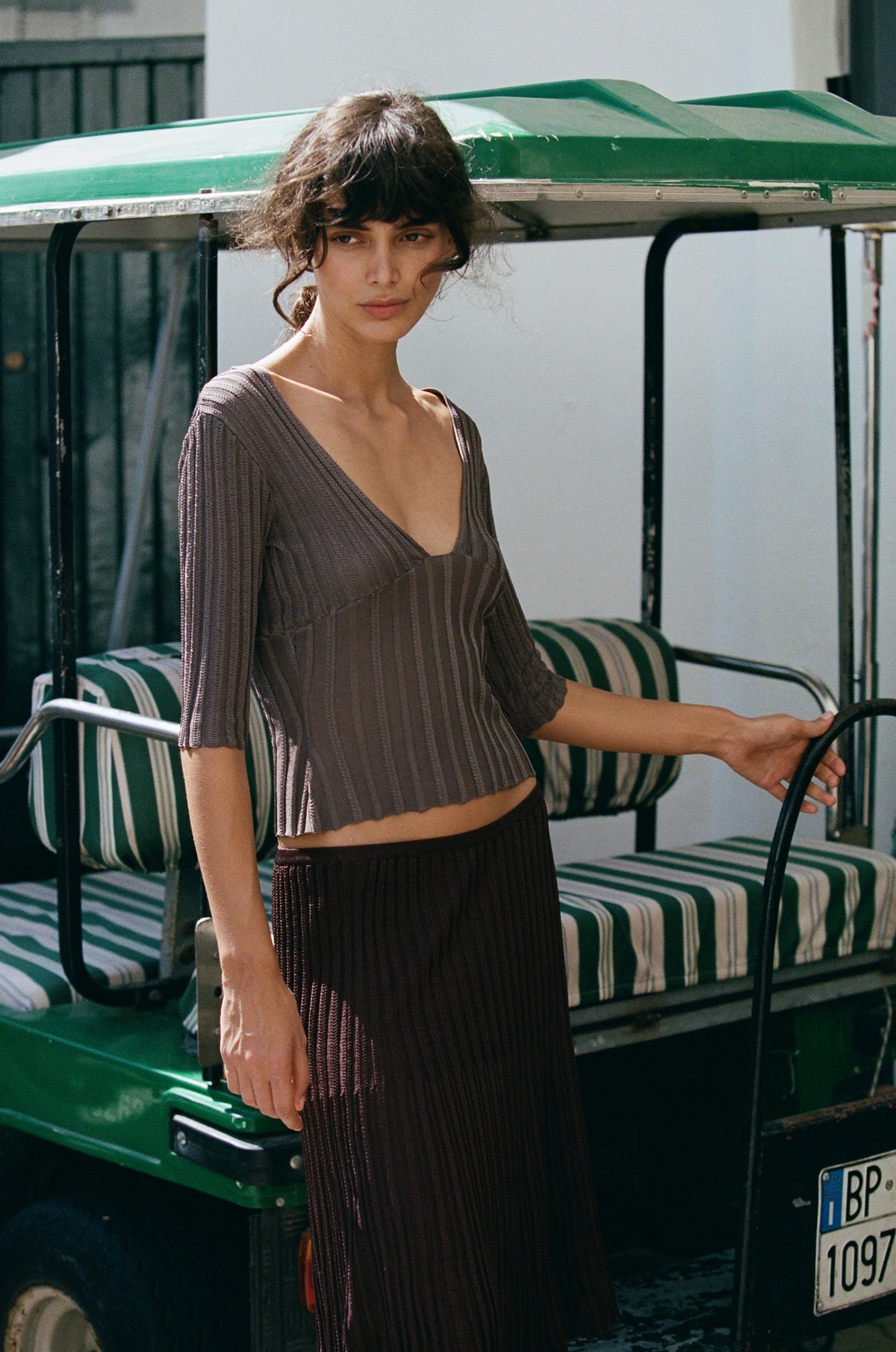 Image of a model wearing Tops. Product name - Veda Top in Smoke colour by brand - With Jéan
